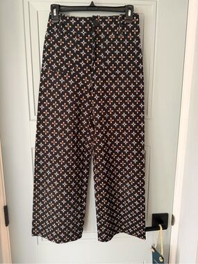 Anthropologie The Colette Blue Ankle Crop Pants with Orange & White Floral Print